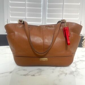 Coach Park Leather Carrie tote (“carryall” style in soft, tan leather)